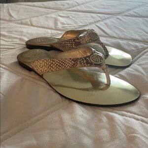 Vince Camuto Gold and Tan snake skin flats.